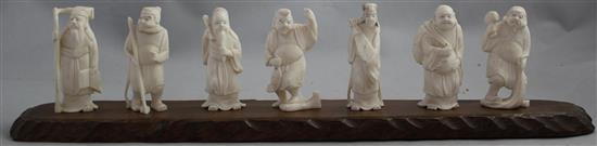 A set  of 7 Japanese ivory figures of the Gods of Happiness and an immortal